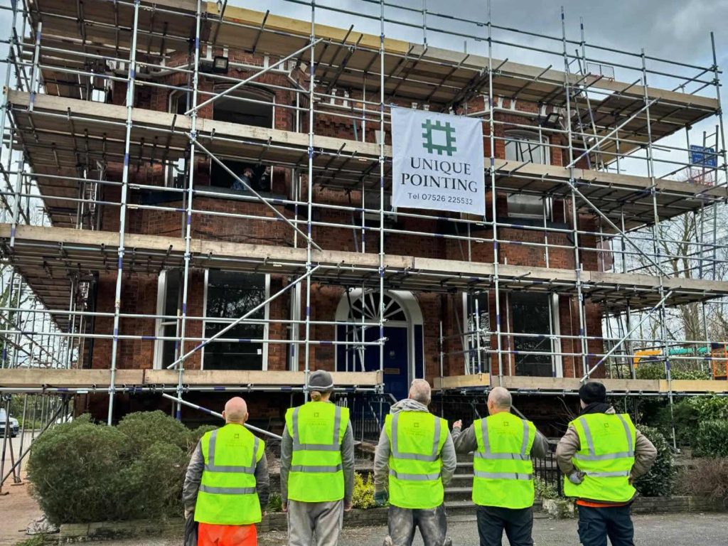 The team of brickwork restoration specialists at Unique Pointing getting ready to clean a heritage Victorian property using DOFF steam cleaning before repointing with NHL 3.5 Lime Mortar.