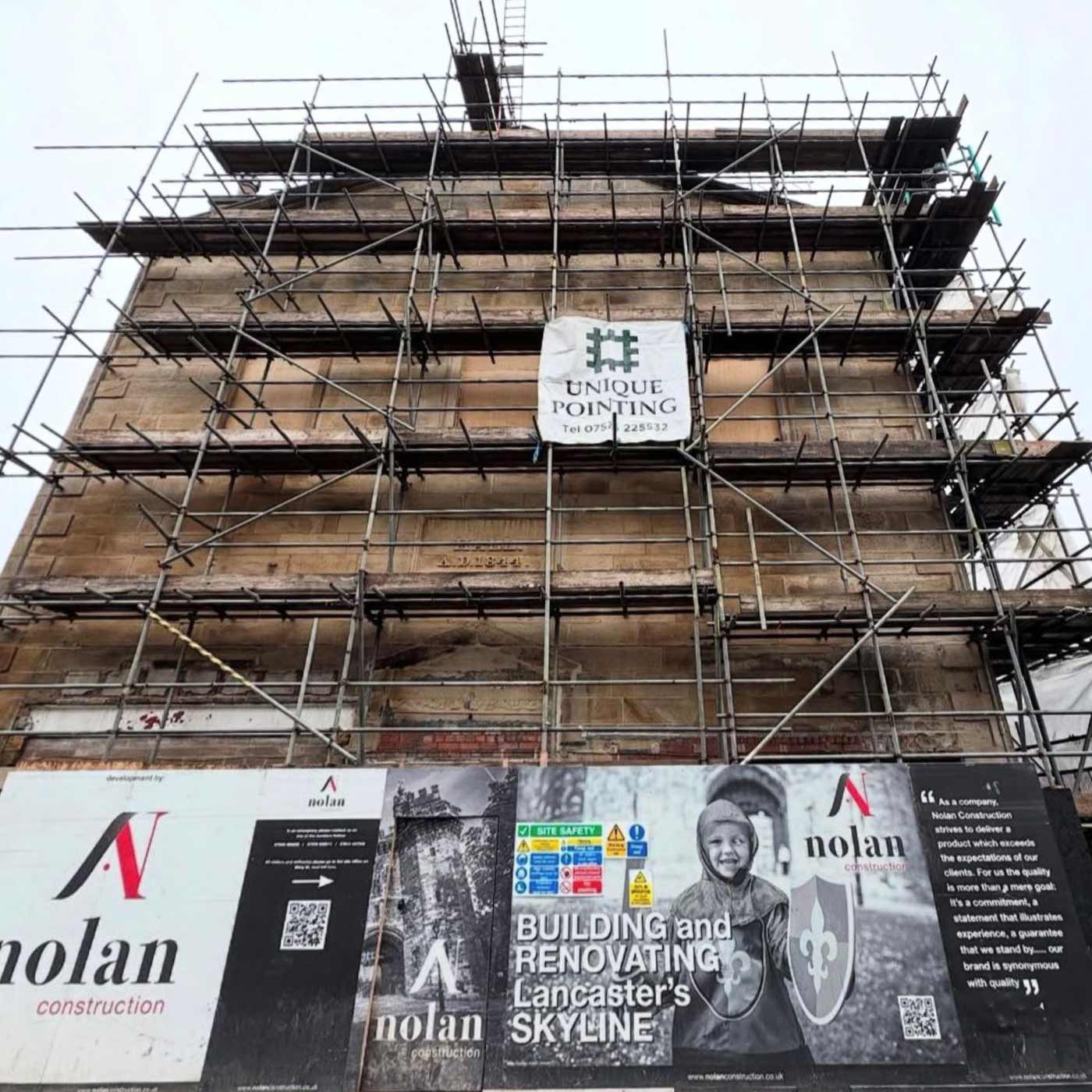 Specialist masonry restoration work - DOFF cleaning and lime mortar repointing - on the old Oddfellows Hall in Lancaster - a conservation property at LA1 1UR