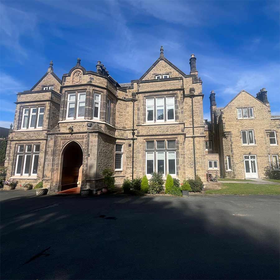 Grade II listed Barclay Hall in Mobberley WA16 7DZ after stone masonry restoration - DOFF cleaning and lime mortar repointing using NHL 3.5.