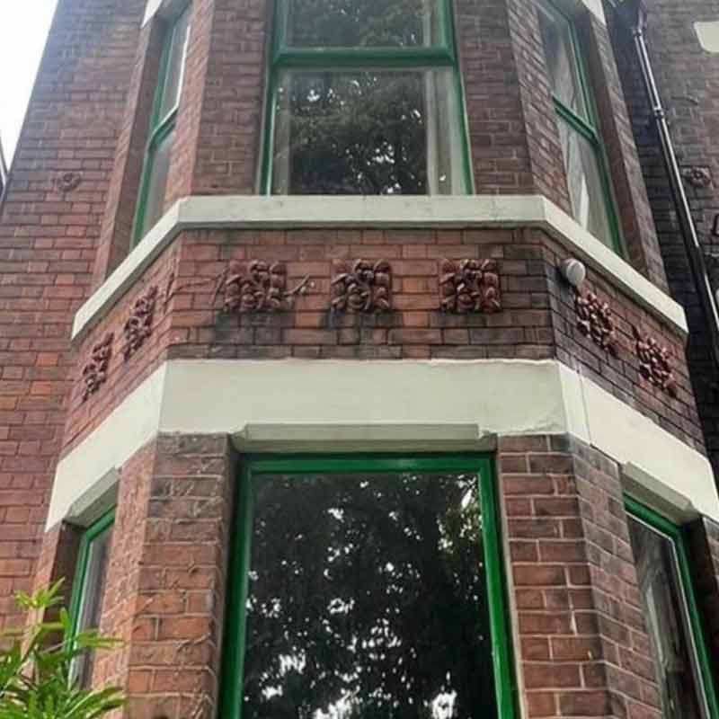 A Victorian terrace in Manchester before undergoing brick cleaning and repointing