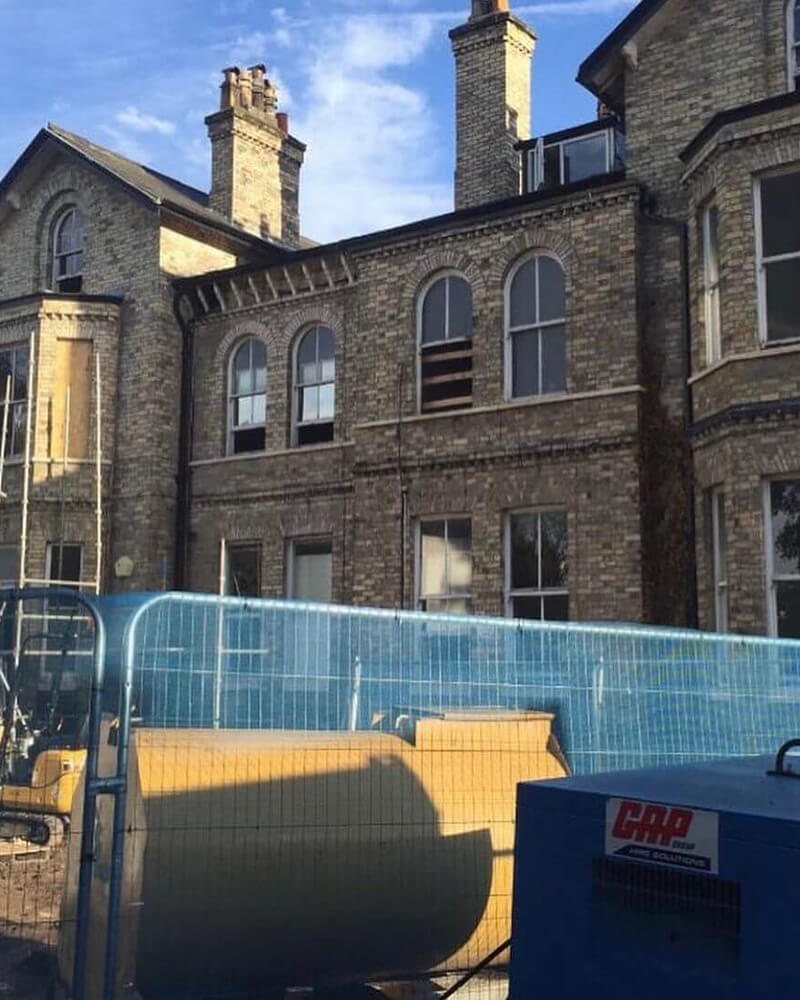 Brick restoration, cleaning and lime mortar repointing and mortar colour matching under way on yellow/buff brickwork on a Victorian Villa at Green Walk, Bowdon, WA14