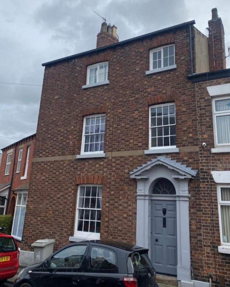 A listed building in Macclesfield before undergoing professional brickwork restoration by Unique Pointing